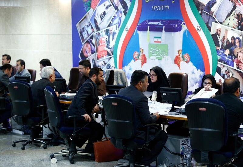 Iranians register their candidacy for Iran's upcoming presidential elections on 19 May at the interior ministry in Tehran. Abedin Taherkenareh / EPA 