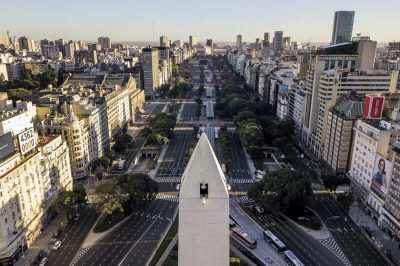 BUENOS AIRES, ARGENTINA - MARCH 20: Aerial view of a nearly empty 9 de Julio Avenue on the first day of total quarantine on March 20, 2020 in Buenos Aires, Argentina. President Alberto Fernandez declared a national quarantine until March 31st to reduce the circulation of the COVID-19 outbreak. Only those who work in the health system, production and commercialization of food, press and other essential services are authorized to circulate. (Photo by Getty Images/Getty Images)