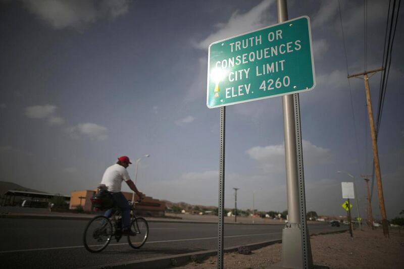 A man cycles into the town of Truth or Consequences, New Mexico. New Mexico taxpayers in 2007 agreed to pony up $225 million to fund the spaceport. Lucy Nicholson / Reuters
