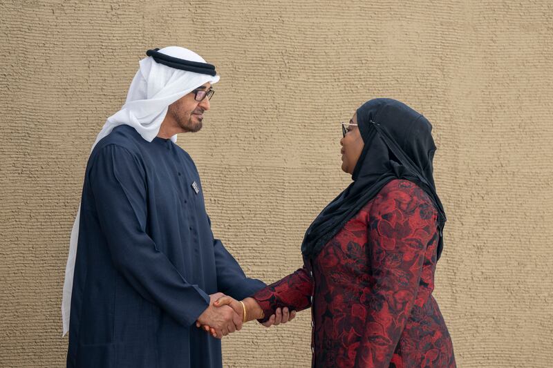 President Sheikh Mohamed greets Samia Suluhu Hassan, President of Tanzania. Eissa Al Hammadi / UAE Presidential Court