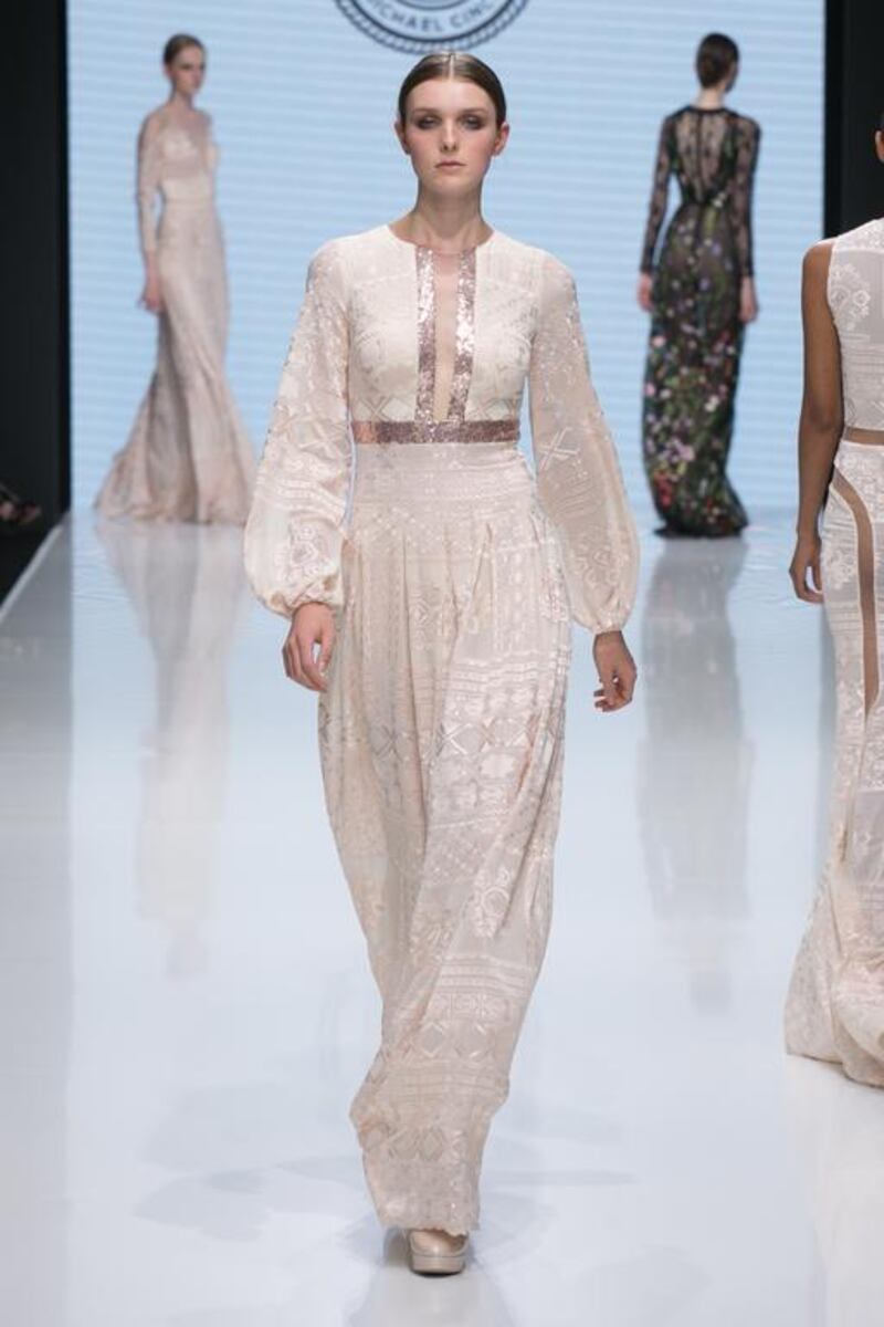 A flowing couture creation in cream. Courtesy Michael Cinco and Couturissimo
