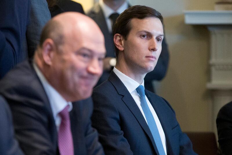 epa06522183 Senior Advisor to President Trump Jared Kushner (R) and Director of the National Economic Council and chief economic advisor to President Trump Gary Cohn (L) attend
a meeting on trade and the economy with members of Congress and US President Donald J. Trump (not pictured) in the Cabinet Room of the White House in Washington, DC, USA, 13 February 2018.  EPA/MICHAEL REYNOLDS