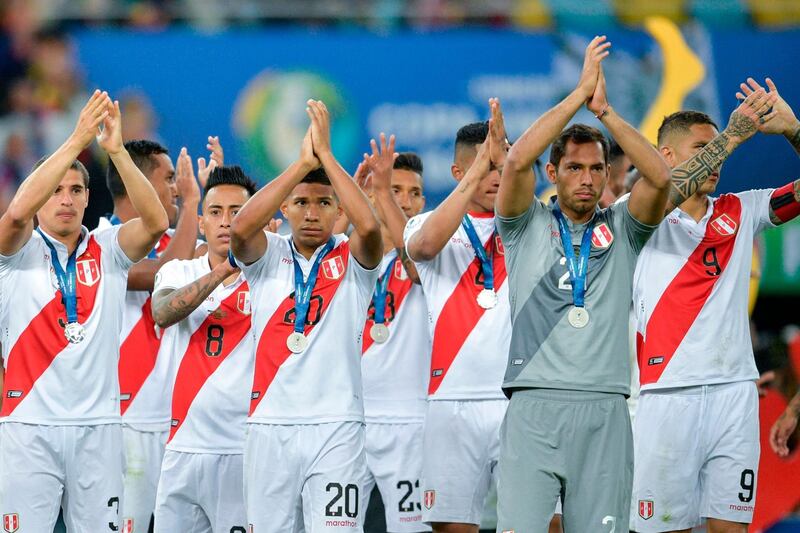 Peru's players acknowledge the crowd. AFP