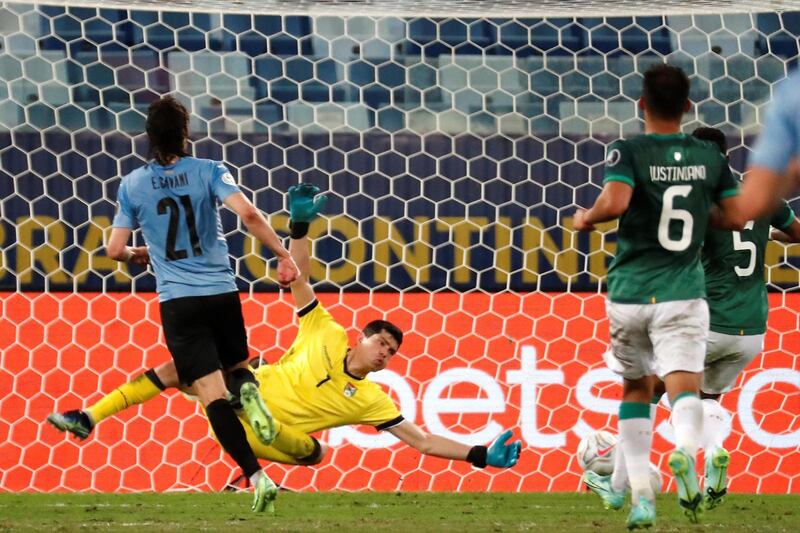 Uruguay's Edinson Cavani scores during the Copa America match against Bolivia. EPA