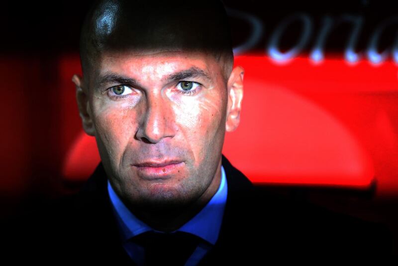 Real Madrid's French coach Zinedine Zidane looks on from the bench before the Spanish Copa del Rey (King's Cup) football match CD Numancia vs Real Madrid CF at the 'Nuevo Estadio Los Pajaritos' stadium in Soria on January 4, 2018. / AFP PHOTO / CESAR MANSO