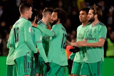 Real Madrid's players celebrate Spanish midfielder Brahim Diaz's goal during the Copa del Rey (King's Cup) football match between Unionistas de Salamanca CF and Real Madrid CF at Las Pistas del Helmantico stadium in Salamanca, on January 22, 2020. / AFP / JAVIER SORIANO