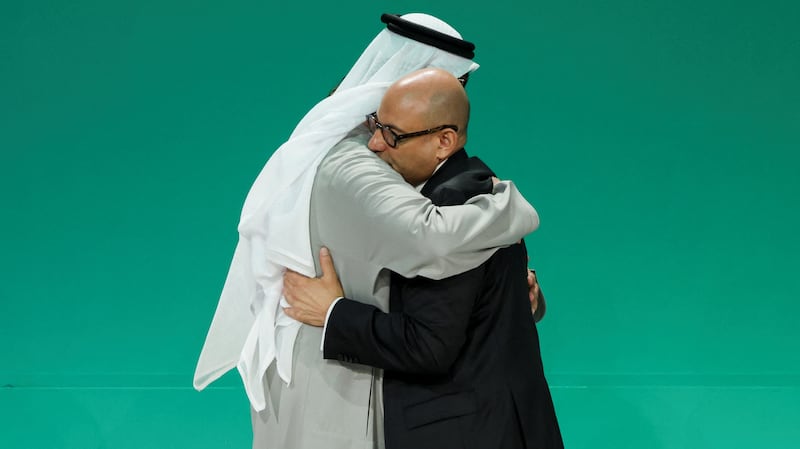 Cop28 President Dr Sultan Al Jaber hugs UNFCCC executive secretary Simon Stiell after a plenary meeting on Wednesday in Dubai. Reuters