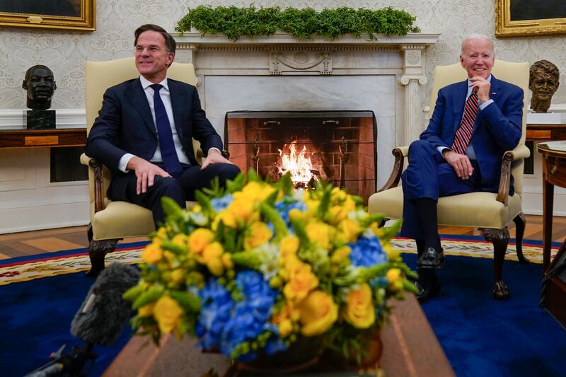 US President Joe Biden, right, meets Dutch Prime Minister Mark Rutte in the Oval Office of the White House in Washington. AP