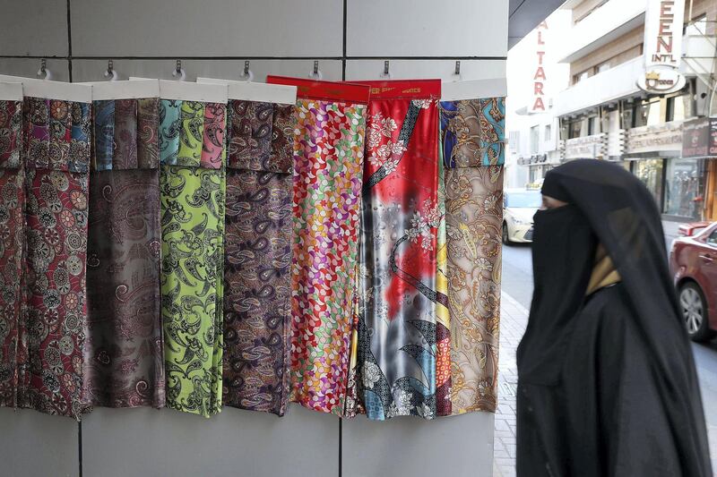 DUBAI , UNITED ARAB EMIRATES , MAY 23 – 2018 :- Garments on display outside one of the shop during the Unseen Trails Iftar Walk presented by Gulf Photo Plus and Frying Pan Adventures in Bur Dubai area in Dubai.  ( Pawan Singh / The National )  For Weekender