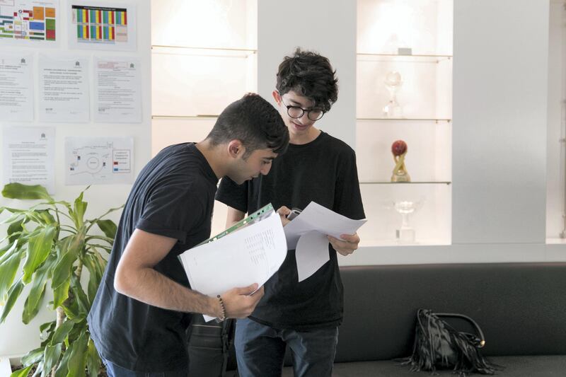 DUBAI, UNITED ARAB EMIRATES - AUG 17: 

Two students exchange their A-level examination results at Jumeirah College School.


(Photo by Reem Mohammed/The National)

Reporter:  Caline Malek
Section: NA