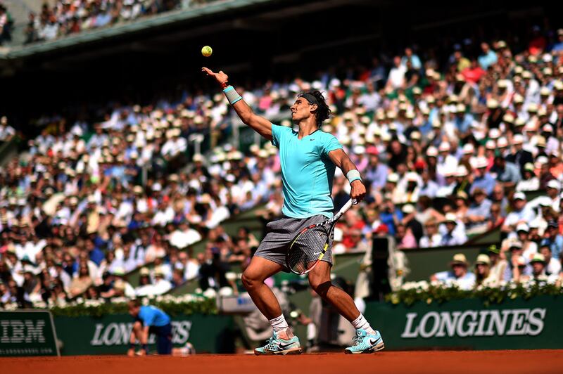 Rafael Nadal of Spain serves during his men's singles match against Leonardo Mayer of Argentina at the French Open on May 31, 2014. Matthias Hangst / Getty Images