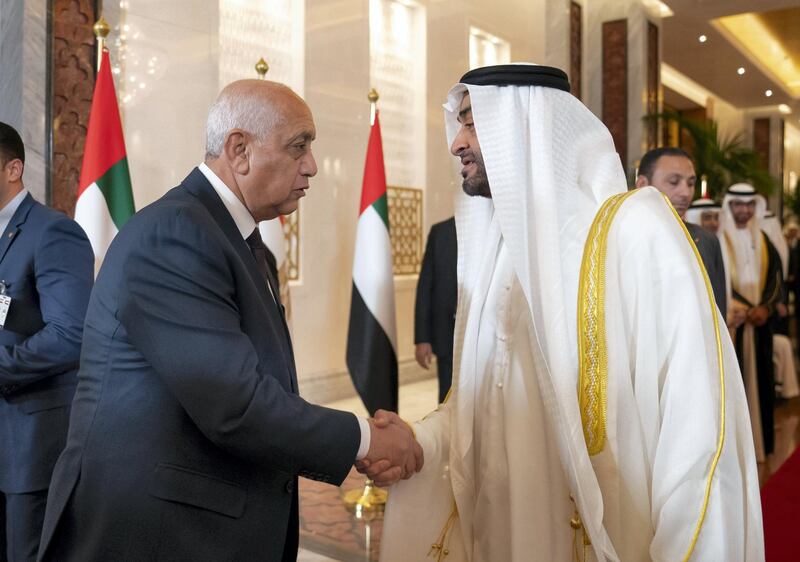 ABU DHABI, UNITED ARAB EMIRATES - November 13, 2019: HH Sheikh Mohamed bin Zayed Al Nahyan, Crown Prince of Abu Dhabi and Deputy Supreme Commander of the UAE Armed Forces (R), greets a delegate accompanying HE Abdel Fattah El Sisi, President of Egypt (not shown), at the Presidential Airport. 

( Mohamed Al Hammadi / Ministry of Presidential Affairs )
---