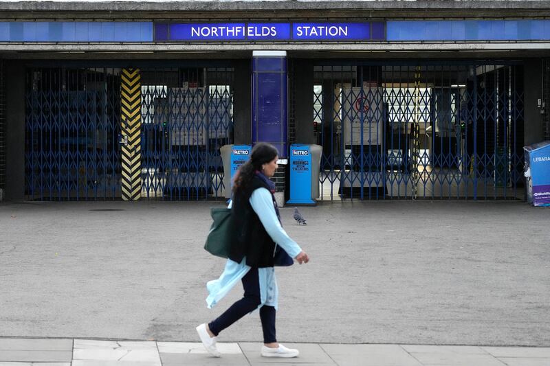 Closed gates at Northfields tube station. AP