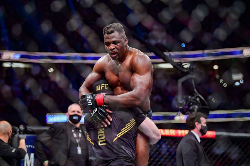 Francis Ngannou celebrates after his victory over Ciryl Gane at UFC 270 at Honda Center, where he retained his UFC heavyweight title. USA TODAY Sports