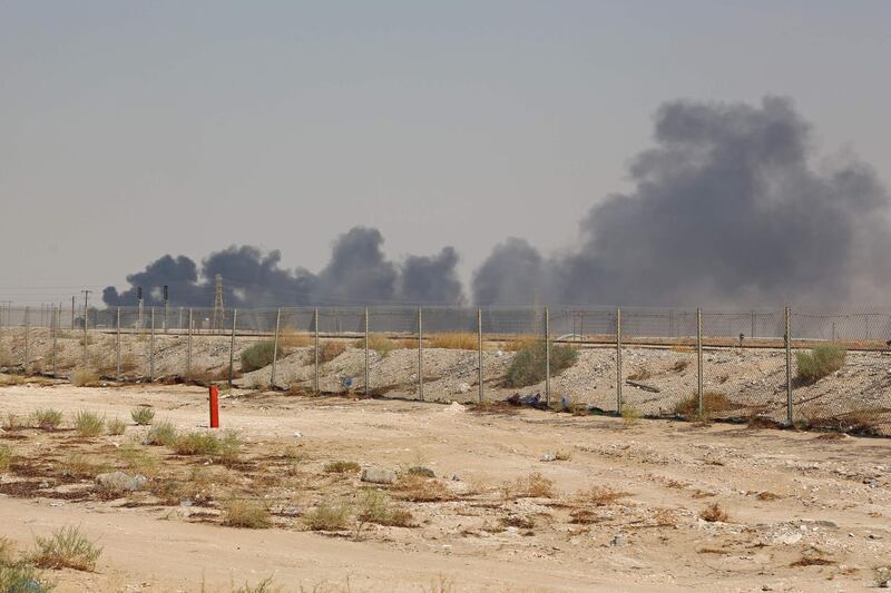 Smoke billows from an Aramco oil facility in Abqaiq about 60km (37 miles) southwest of Dhahran in Saudi Arabia's eastern province on September 14, 2019. Drone attacks sparked fires at two Saudi Aramco oil facilities early today, the interior ministry said, in the latest assault on the state-owned energy giant as it prepares for a much-anticipated stock listing. Yemen's Iran-aligned Huthi rebels claimed the drone attacks, according to the group's Al-Masirah television.
 / AFP / -

