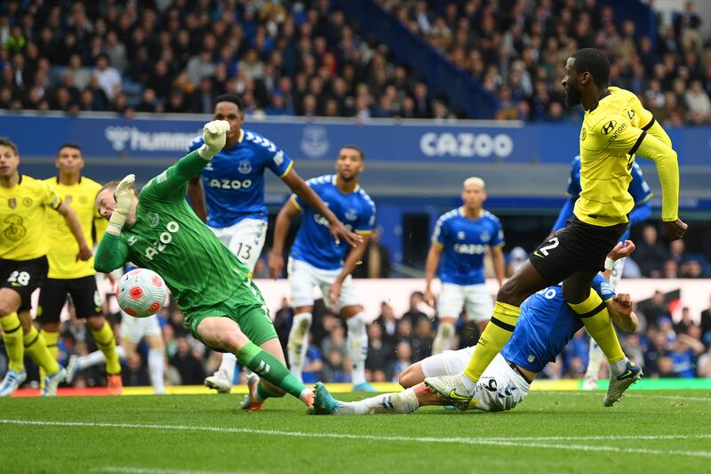 Everton's Jordan Pickford blocks Antonio Rudiger's shot with his face. Reuters