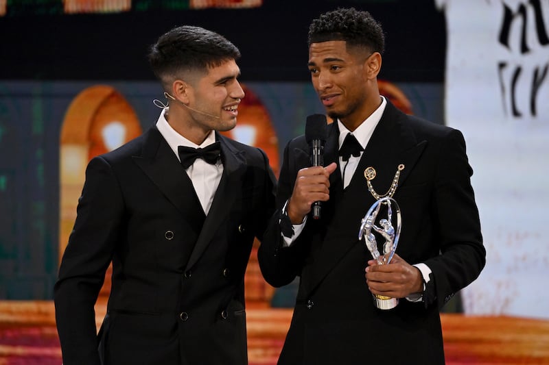 Men's tennis player Carlos Alcaraz on stage with Jude Bellingham to present the Real Madrid midfielder with the Laureus World Breakthrough of the Year award. Getty
