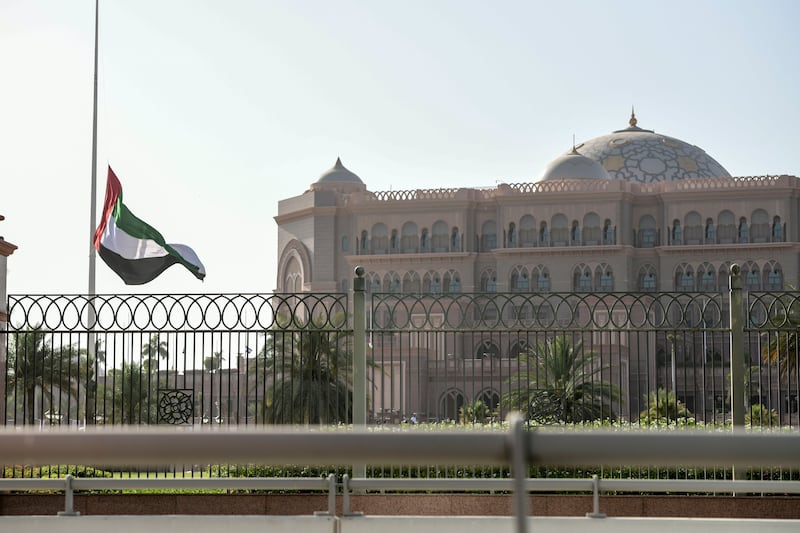 Flags fly at half-staff at Emirates Palace along the Corniche in Abu Dhabi after the death of President Sheikh Khalifa. Khushnum Bhandari / The National