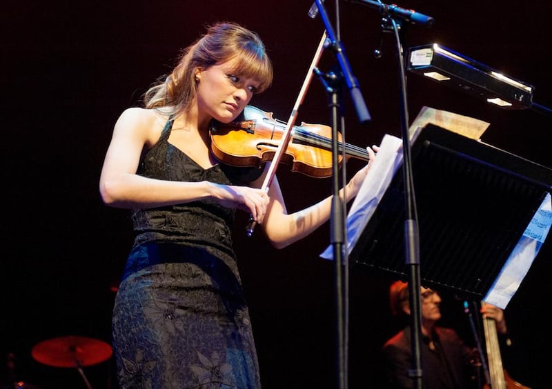 Nicola Benedetti performs on stage during the opening night of Celtic Connections Festival at Glasgow Royal Concert Hall in 2014. Photo by Ross Gilmore / Redferns via Getty Images