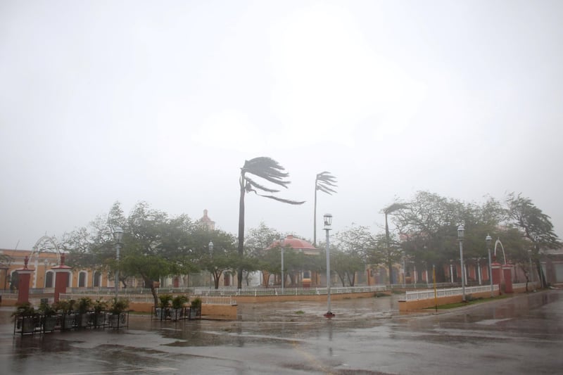 Trees sway in the wind at the main square as Hurricane Irma passes by Remedios, Cuba September 8, 2017. REUTERS/Alexandre Meneghini