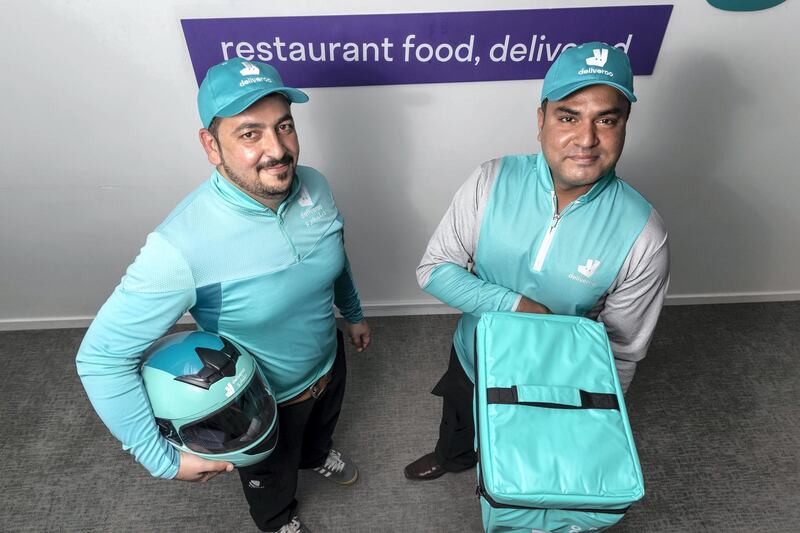  Deliveroo awards top UAE riders up to 45,000Aed to celebrate the company going live on the stock market earlier this year. Riders (LtoR) Muhammad Khurram, 35 Pakistan and  Muhammad Zeeshan Ali, 35 Pakistan, on May 4th, 2021. 
Antonie Robertson / The National.
Reporter: Kelly Clarke for National
