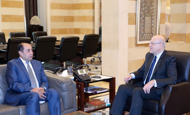 Lebanese Prime Minister Najib Mikati meets Hossam Zaki at the government palace in Beirut. EPA
