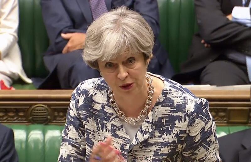 British prime minister Theresa May faces rising pressure to resolve a deadlock on Brexit negotiations, prompting fears of a currency slide. AFP / Parliament Recording Unit