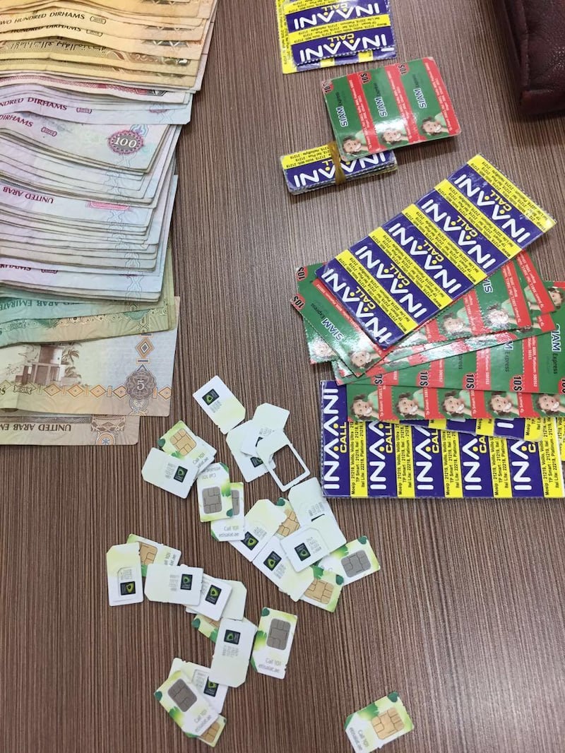 Police in Dubai have recovered sim cards used by alleged fraudsters in a series of raids