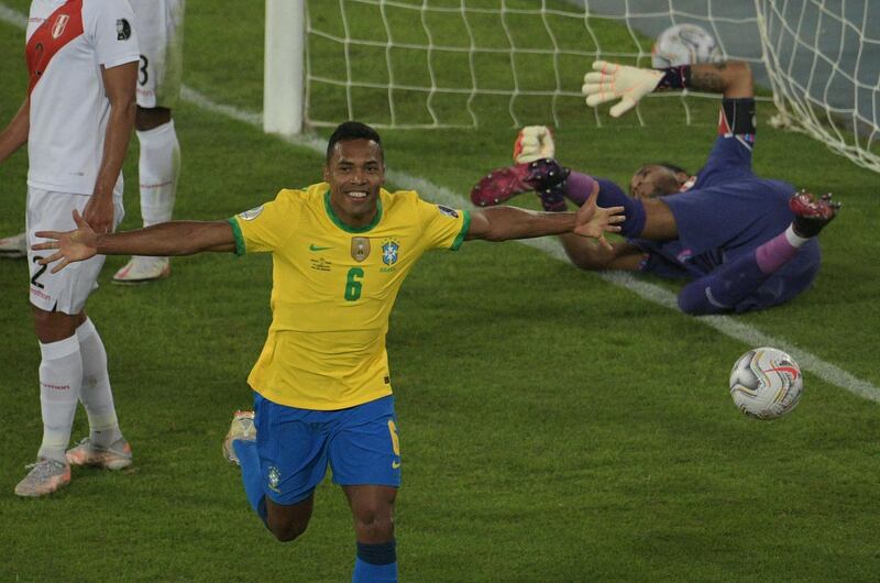 Brazil's Alex Sandro celebrates after scoring against Peru. AFP