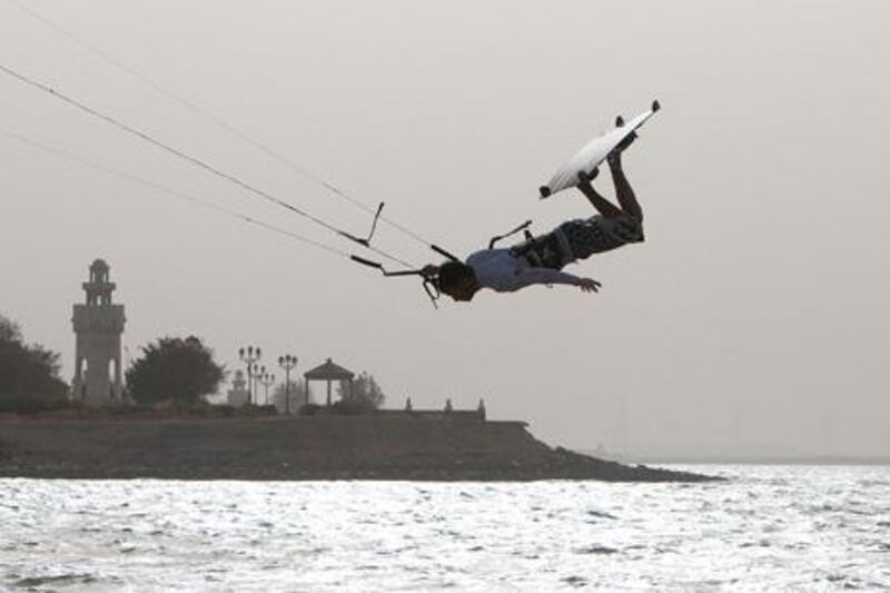  Mirfa Beach, United Arab Emirates, April 20 2012, 2012 Al Gharbia Watersports Festival- A kite surfer goes vertical just off the Mirfa Beach. Mike Young / The National