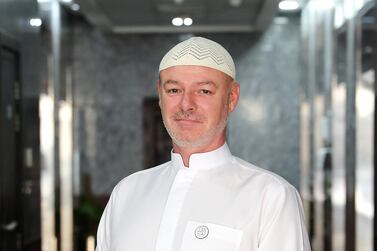 Sean Bessit at his home in Ajman, where he cooks his own iftar meals. Pawan Singh / The National