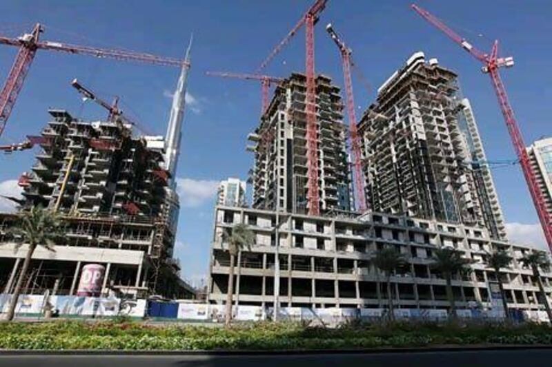The Dubai Land Department recorded Dh143 billion (US$38.93bn) in property transactions last year, a 16 per cent rise on 2010. Pawan Singh / The National
