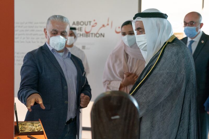 Sheikh Dr Sultan is shown some of Gibran's personal belongings during the tour.