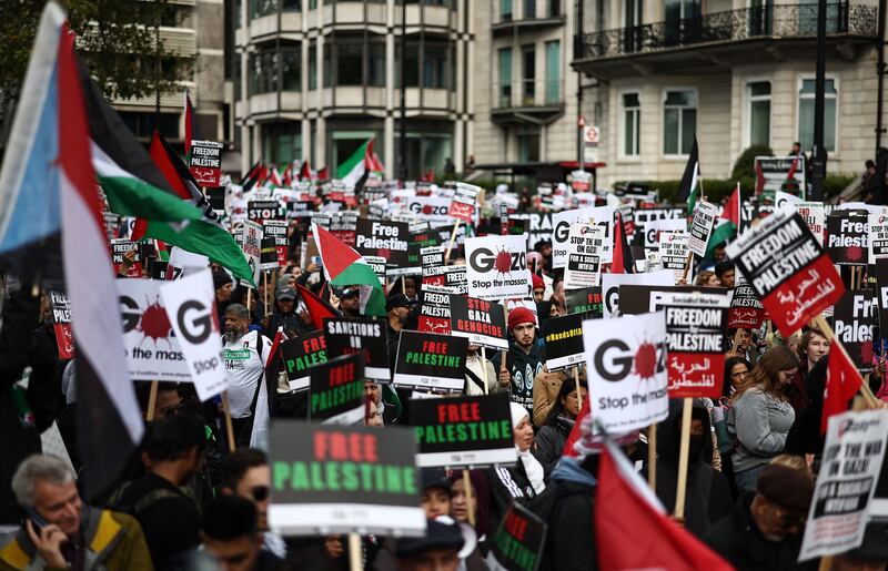 People take part in a 'March For Palestine' in London, to demand an end to the war on Gaza. AFP