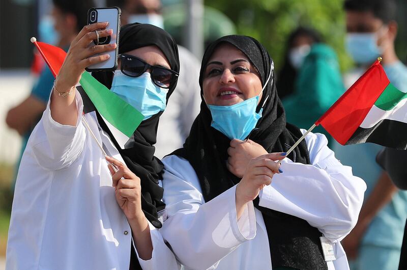 Dubai, United Arab Emirates - Reporter: N/A. News. Fursan Al Emarat, the UAE Air Force's aerobatic display team fly over Al Kuwait Hospital in Dubai. Tuesday, June 23nd, 2020. Dubai. Chris Whiteoak / The National