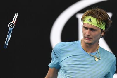 epa06456168 Alexander Zverev of Germany throws his racquet while in action against Hyeon Chung of South Korea during their third round match on day six of the Australian Open tennis tournament, in Melbourne, Victoria, Australia, 20 January 2018.  EPA/JULIAN SMITH AUSTRALIA AND NEW ZEALAND OUT