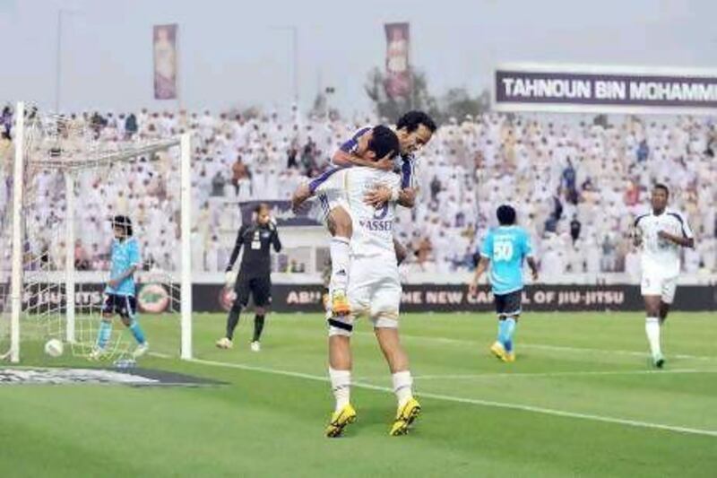 Al Ain FC celebrates a score at a recent Pro League football game in Al Ain. Anas Kanni / Al Ittihad