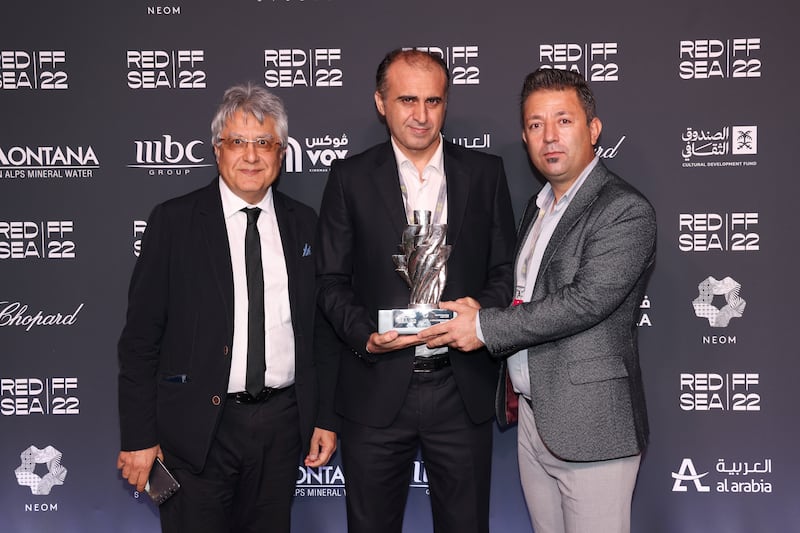 Director Reza Jamali, centre, was awarded the prize for  Best Screenplay for A Childless Village