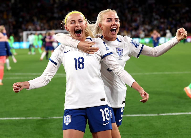 England's Chloe Kelly celebrates with Alex Greenwood after scoring the winning penalty in the shoot-out against Nigeria in the Women's World Cup last-16 match at Brisbane Stadium, Australia, on Monday, August 7, 2023. PA