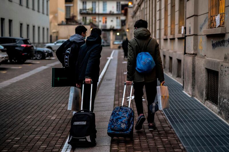 Students enter in the Italo Calvino school in Turin. AFP