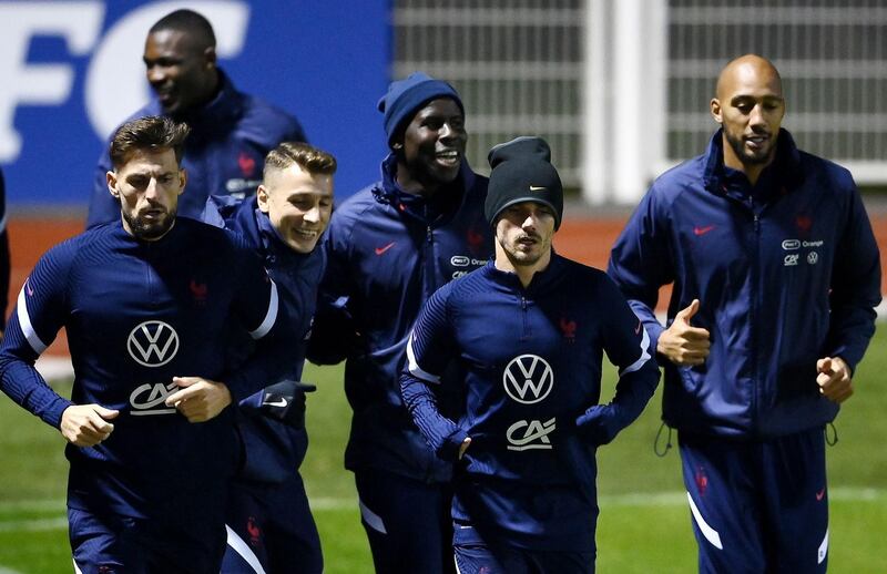 Left to right: Benoit Costil, Luca Digne, Antoine Griezmann and midfielder Steven N'Zonzi. AFP