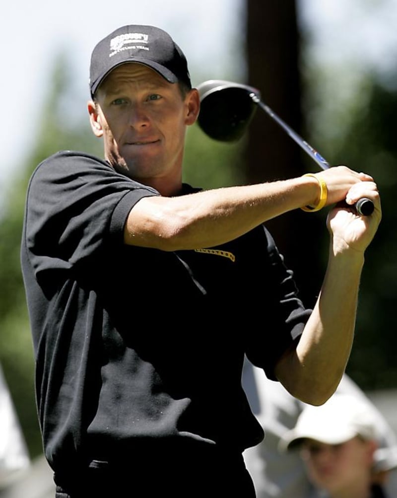 Seven-time Tour de France champion Lance Armstrong tees off on the eighth hole at the American Century Celebrity Golf Championship, Thursday, July 13, 2006, in Stateline, Nev. (AP Photo/Rich Pedroncelli)