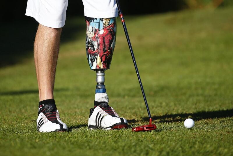 Double amputee Bob MacDermott from Canada putts during the final round of the World Disabled Golf Championship at King David Mowbray Golf Club, Cape Town, South Africa. Teams of golfers with varying disabilities from the United States, Canada, South Africa, Ireland, Sweden, Spain, Britain and Denmark took part in the week-long competition. Nic Bothma / EPA / May 19, 2017