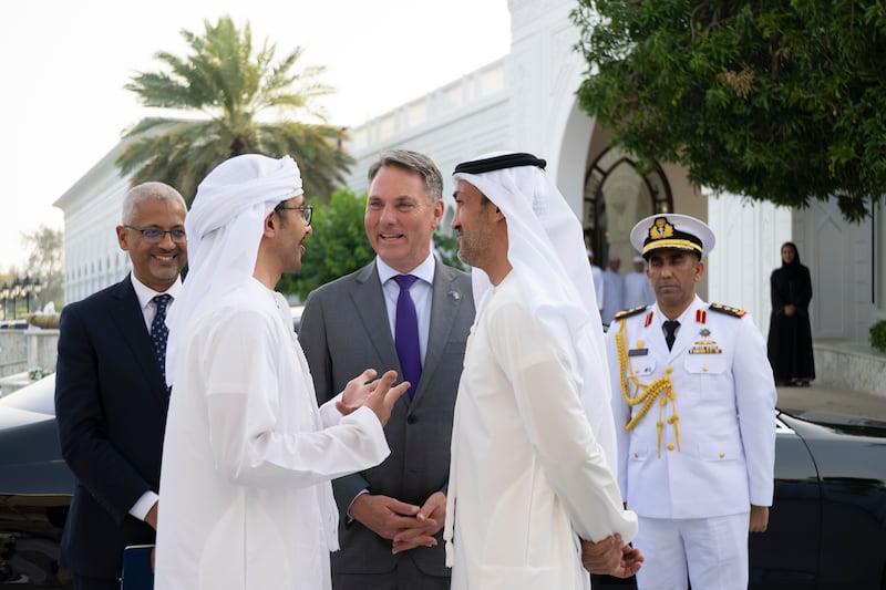 Sheikh Abdullah bin Zayed, Minister of Foreign Affairs, receives Richard Marles, Deputy Prime Minister and Minister of Defence of Australia, during a Sea Palace barza. Also pictured is Mohamed Al Mazrouei, Minister of State for Defence Affairs. Mohamed Al Hammadi / UAE Presidential Court 