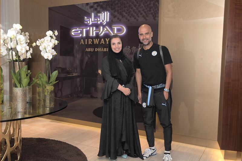 Etihad's Amina Taher and Pep Guardiola. Photo by Etihad Airways