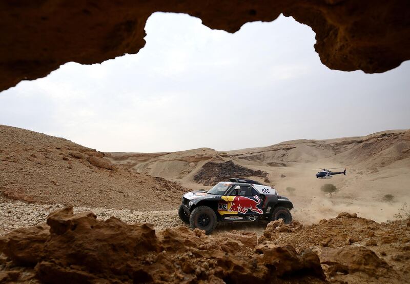 Mini's driver Stephane Peterhansel and his co-driver Edouard Boulanger compete during Stage 5 of the Dakar Rally between Riyadh and Buraydah in Saudi Arabia, on Thursday, January 7. AFP