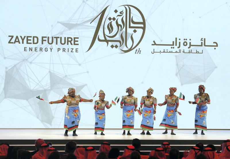 Abu Dhabi, United Arab Emirates - January 15th, 2018: Dancers from Malawi at the Sheikh Zayed Future Energy Prize awards ceremony as part of Abu Dhabi Sustainability Week. Monday, January 15th, 2018 at Abu Dhabi National Exhibition Centre (ADNEC), Abu Dhabi. Chris Whiteoak / The National