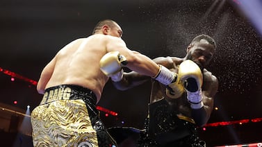 Zhilei Zhang lands the punch that knocks out Deontay Wilder during their headline bout in the 5-vs-5 event in Riyadh. Getty Images