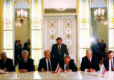 Russia's President Boris Yeltsin, second right, Ukraine's President Leonid Kravchuk, second left, Belarus' leader Stanislav Shushkevich, third left, Russia's State Secretary Gennady Burbulis, right, Belarus' Prime Minister Vyacheslav Kebich, third right, and Ukraine's Prime Minister Vitold Fokin, left, sign an agreement terminating the Soviet Union, on December  8, 1991. The agreement by the republics of Russia, Ukraine and Belarus dealt the final, deadly blow to the USSR.  AP Photo