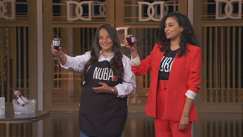 Egyptian-Canadian entrepreneurs Amal Soliman, left, and Logaina El Kattan present their hibiscus tea to the 'Dragons' Den' judges. Photo: supplied